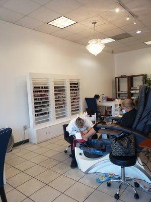 New Management. Fresh. Clean. New chair. New table. New nail polish. Look very big salon.