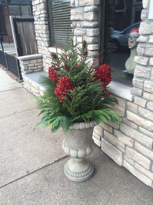 Whimsical Holiday pot dropped into a beautiful urn on Grand Avenue