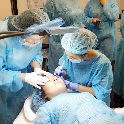 Microblading training hands on practice on live models