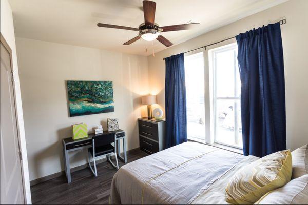 Our apartments bedrooms are furnished with a unique furniture package, walk in closet, and private bathroom.