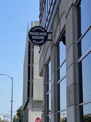 Outside sign above the entrance on Capital Street.