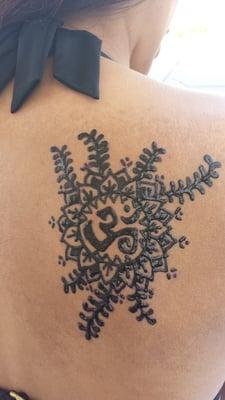 Traditional henna tattoo. Comes in black or brown