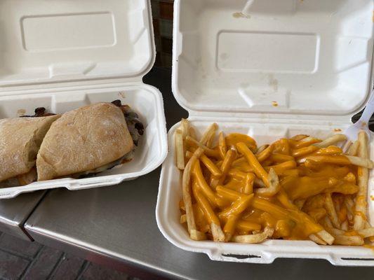 Philly sandwich and cheese fries.