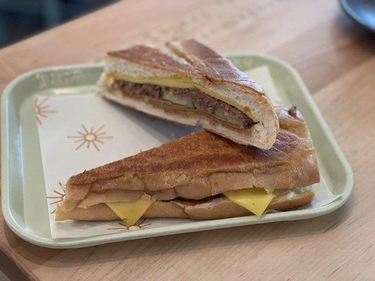 Cubano with seitan (ham), jackfruit (pork roast), vegan cheese, pickles, mustard, Cuban bread