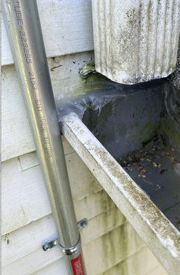 Conduit too tight to the gutter dislodging it slightly off the siding creating leaks down below. "You can't prove it was us"  is their answ