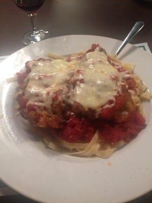 Veal parmesan over fettucini