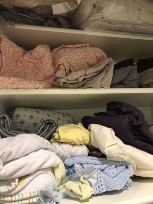 BEFORE photo of linen closet