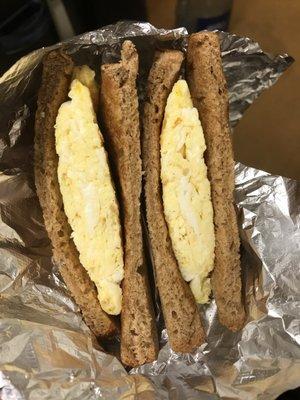 2 eggs scrambled on whole wheat toast $2