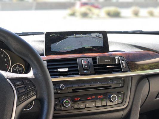 Camera installed and integrated to the factory screen of a 2016 BMW