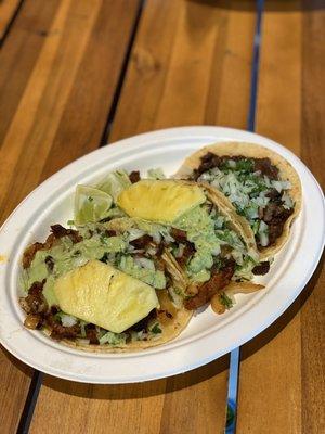 Al pastor tacos and carne asada