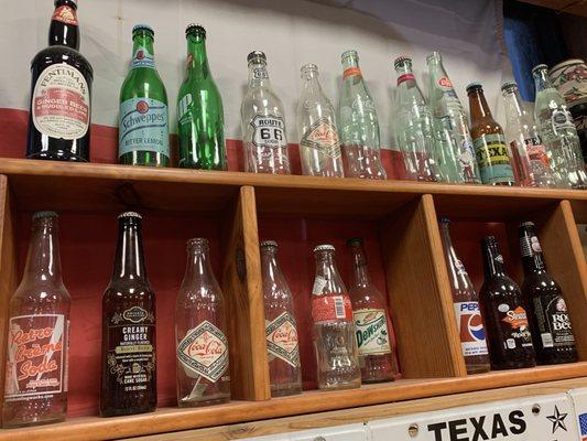 Display of old soda bottles