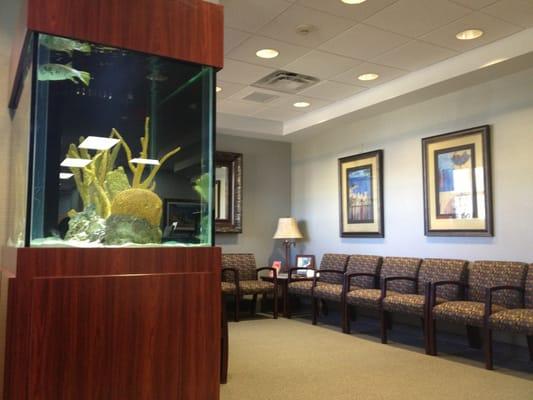 Pretty waiting area with aquarium.