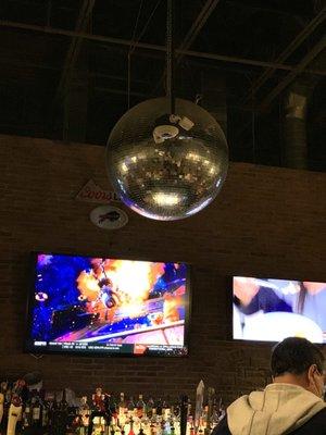 Pretty HUGE glitter ball above the bar!