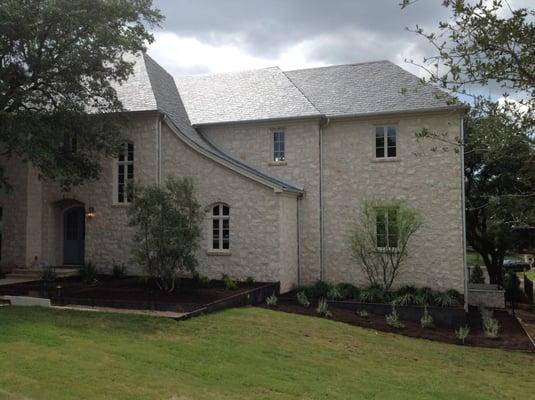 This roof is very steeply pitched and over 30 feet high at the peak.  Each piece of slate is handpicked and meticulously plac...