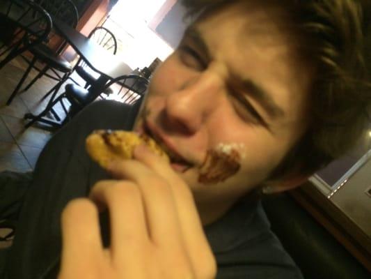 Fried Oreo Chocolate shot out on kids cheek