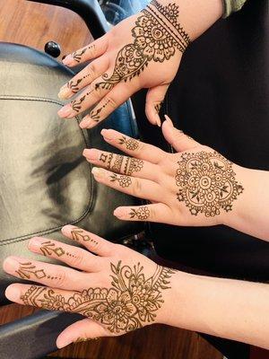 Simple henna design; happy customers