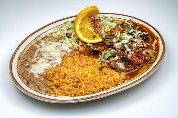 Grilled steak, onion & bell peppers in a seasoned tomato sauce, served with your choice of corn or flour tortillas.