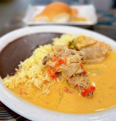 Pollo en Crema y Loroco: Chicken in cream sauce, herbs, vegetables, rice, choice of tortillas or pan francés | $16.95