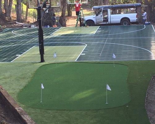 Multi sport game court with putting green