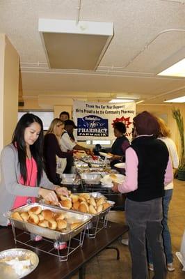 We bought, set-up, & served a hot meal to Seniors as part of our weekly community give-back.