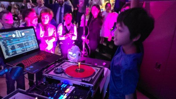 Let my very talented 9 year old son take the tables for 15 minutes at his own school dance, he did awesome.