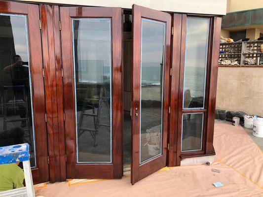 Keeping these exterior entry doors as even and translucent as possible while making them shine and protected from the salty air at the beach