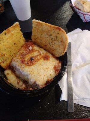 Very small serving of lasagna without side salad for $9