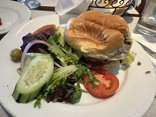 Phillies burger with a side salad