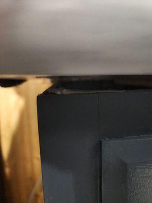 Nothing holding countertop to cupboard