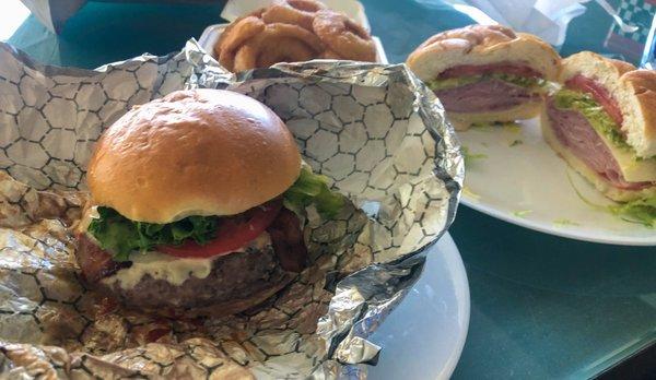 Nooney burger, "Italian" on kaiser roll, onion rings