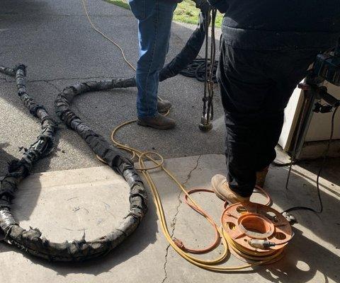 Pumping "filler" to lift sinking driveway