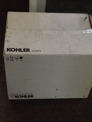 This large Kohler box was left in from of my garage door.