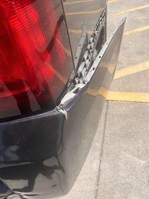 Passenger back side bumper ripped off from car wash machine