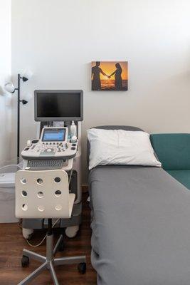 Ultrasound accommodations include a massage-grade scanning bed for mothers' comfort.