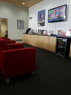 Waiting area complete with complementary coffee, cookies, soda, and water.