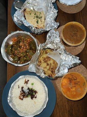 Veggie Sadeko MOMO, Side of Rice, Baigan Bharta, Aloo Kauli, Aloo Paratha, and Garlic Naan