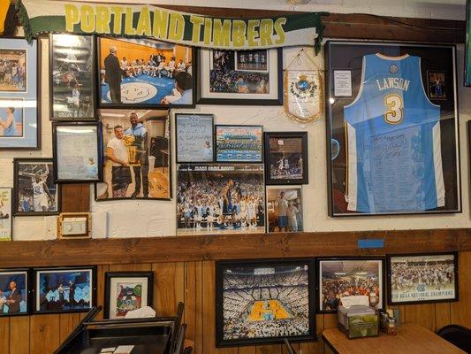 Inside. Dining room decor. Autographed Ty Lawson Denver Nuggets jersey. Picture of Harrison Barnes bringing the NBA trophy to IP3.