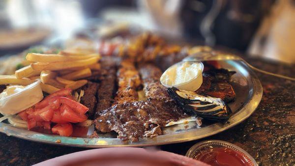 Combo for two: beef kabob, tawouk kabob, kafta kabob, chicken kafta kabob (includes) several sides