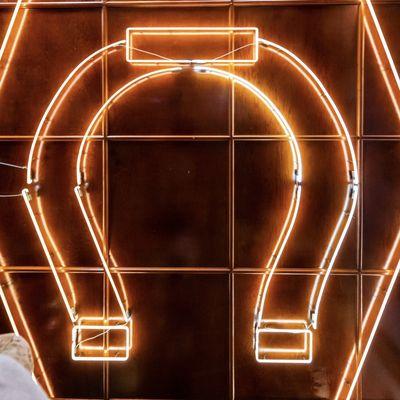 The iconic Horseshoe neon sign inside above our diners.