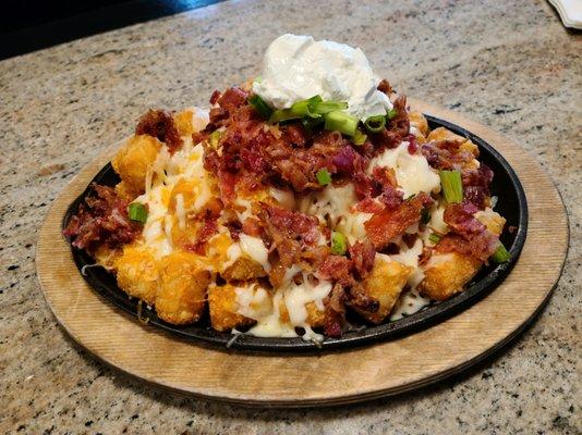 Loaded Tots appetizer - highly recommend! More than enough for two.