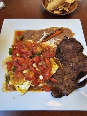 Special plate to my licking.  Huevos rancheros with steak