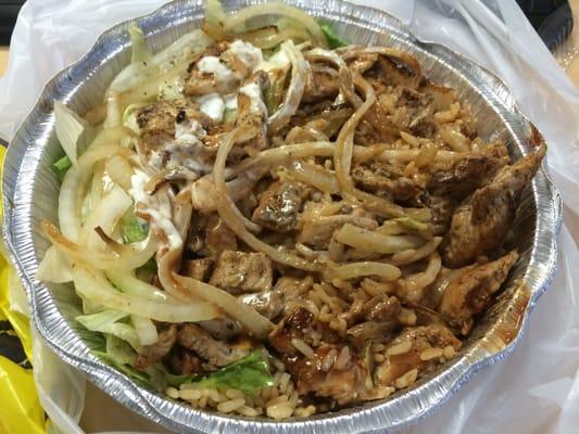 Chicken and rice with salad, BBQ and white sauce