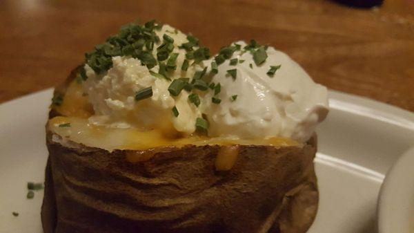 Loaded baked potato ~ REAL bacon bits are in the middle! Yumbers!