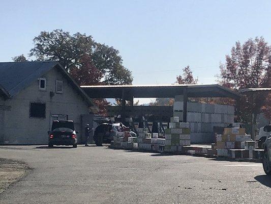 Picking up mystery wine cases at their warehouse in Hopland during their community wine sale