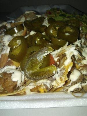 Carnitas Nachos $7.99