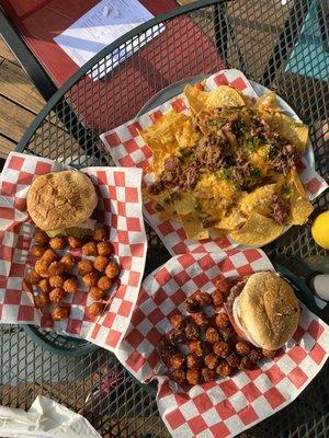 House Burgers with tater tots and the pulled pork nachos.