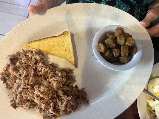 Pulled pork, fried okra, and garlic bread