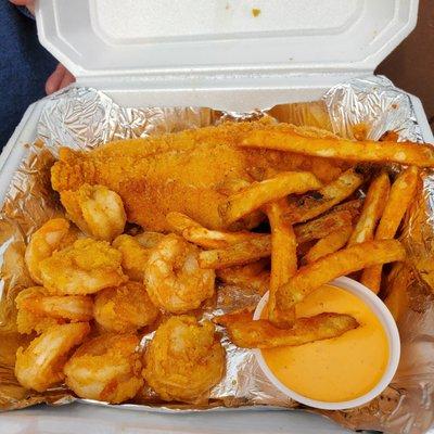 Shrimp basket with an extra piece of catfish