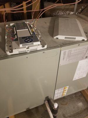 Control panel removed from unit, cover taken off, screws strewn about. They left it like this 3 weeks ago and have yet to put it back.