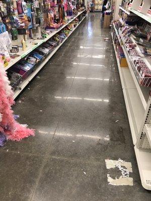 Aisle 2, no those aren't specks in the floor, that's all trash